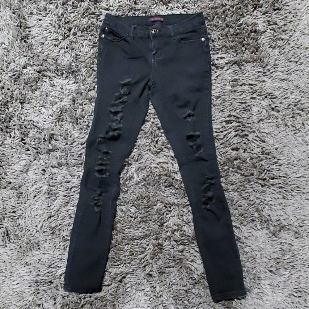 Black stretchy ripped jeans